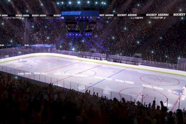 An illuminated ice hockey rink in a crowded arena with fans, spotlights, and banners. The scoreboard is showing, and the atmosphere is lively.