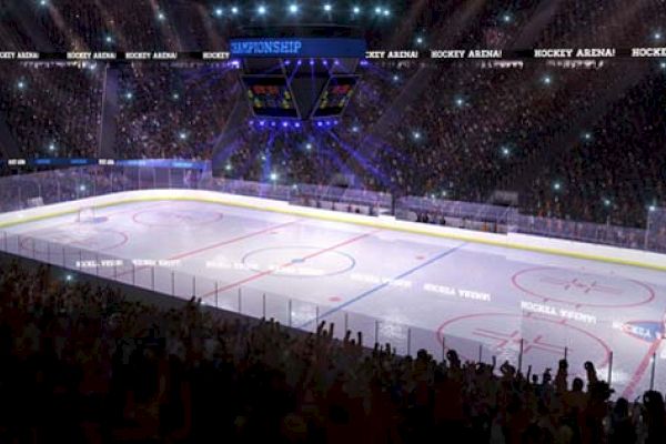 The image depicts a brightly lit hockey arena filled with spectators. The ice rink is central, and a scoreboard hangs above the rink.